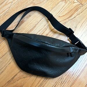 LV black bum bag. Never worn.